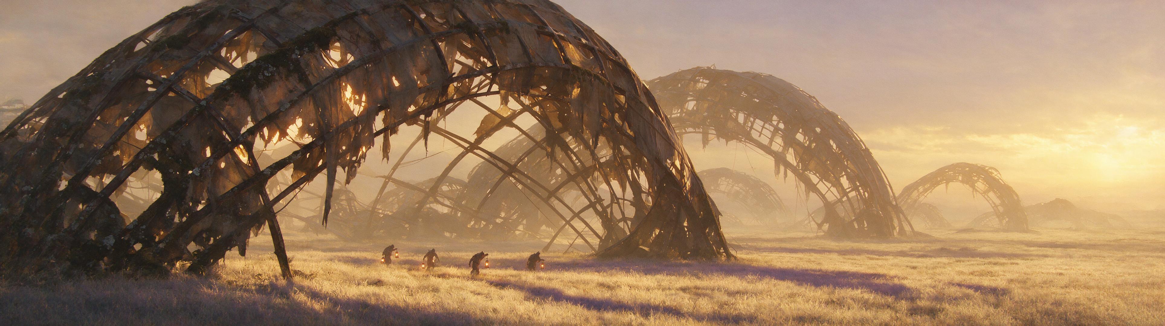 Airship graveyard at dusk — 32:9 ultrawide wallpaper rendered in Strata